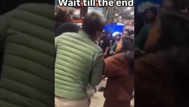 Pokemon Scalper Elbows Another Pokemon Scalper in Front of Wife