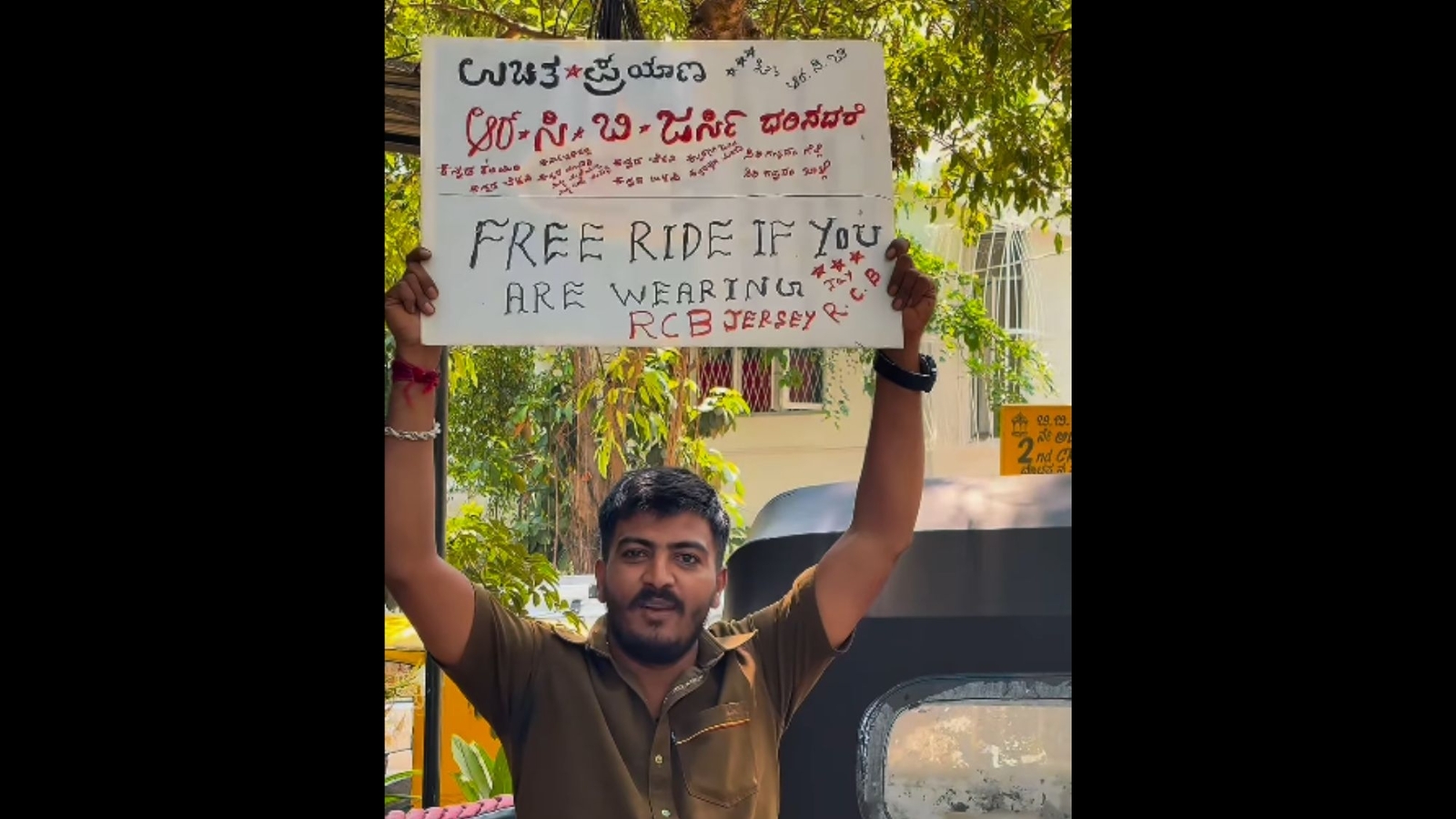 Bengaluru Auto Driver offers free rides to RCB fans sports team jerseys. Watch video