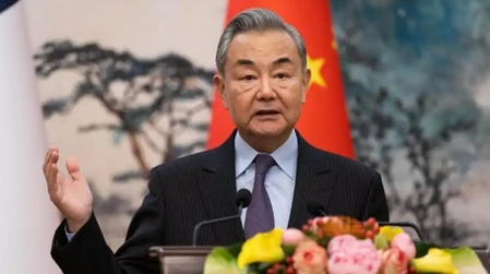 If America will participate in extortion, China will raid firmly: Wang Yi