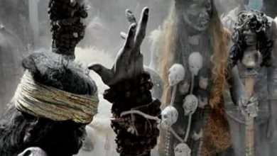 Why do you play Holi with the ashes of the fire in Kashi?