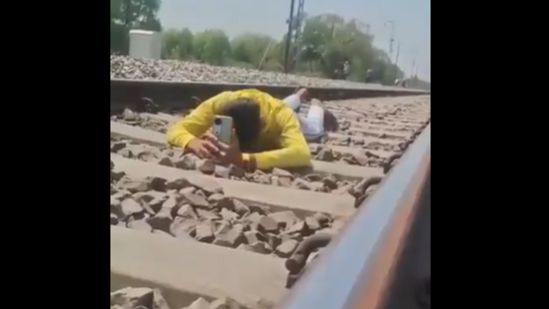 A person from UP was lying on the railroad while the train was about him, he was arrested after the video became viral.