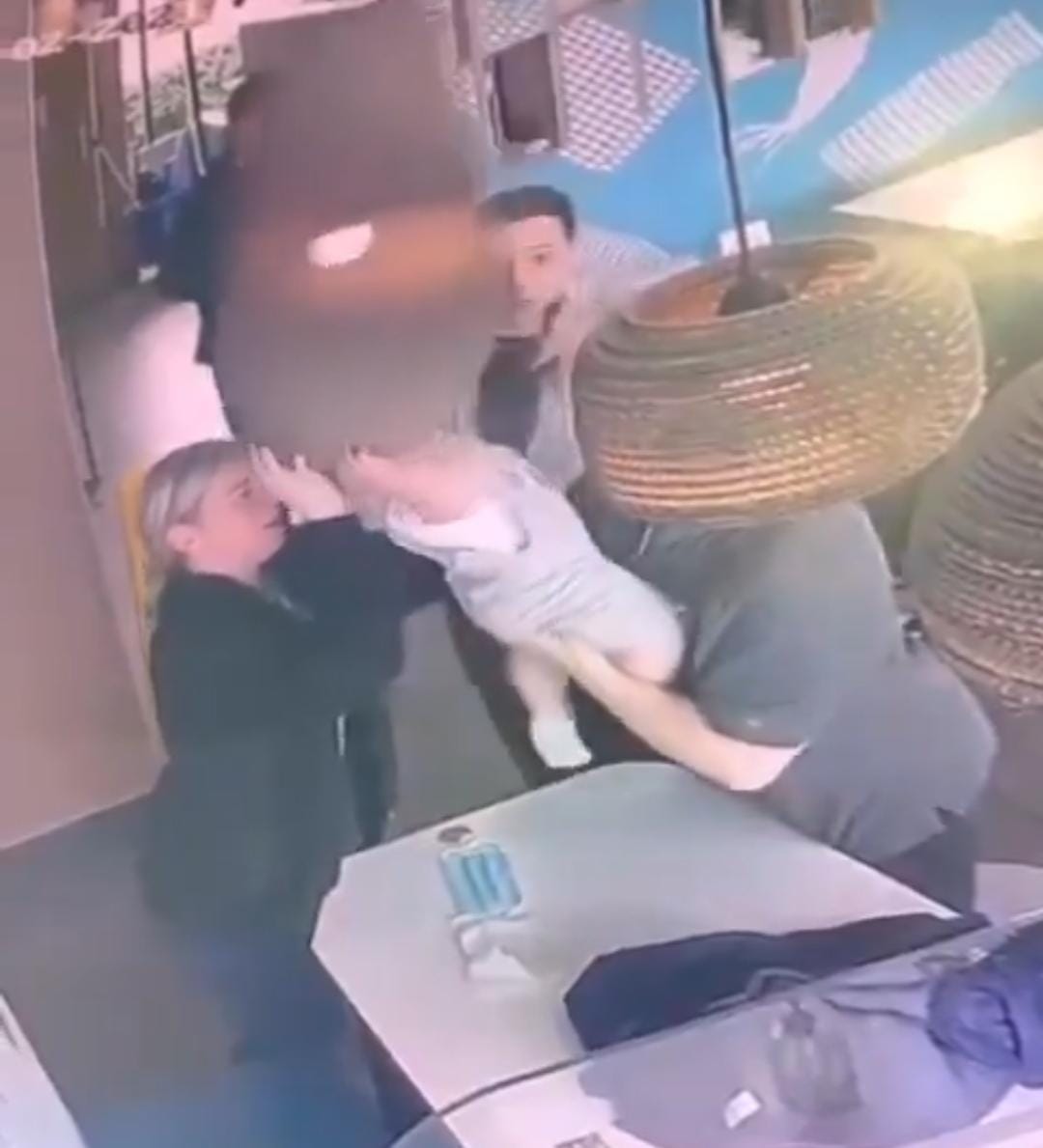 A joke that almost claimed the life of a baby after placing his head inside a lamp .. video – ryan