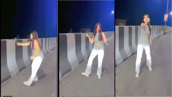 The video of a young woman bursting beer bottle on the highway in Kaushambi