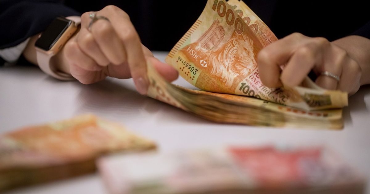 Hong Kong sells a record amount of the currencies to defend the exchange rate