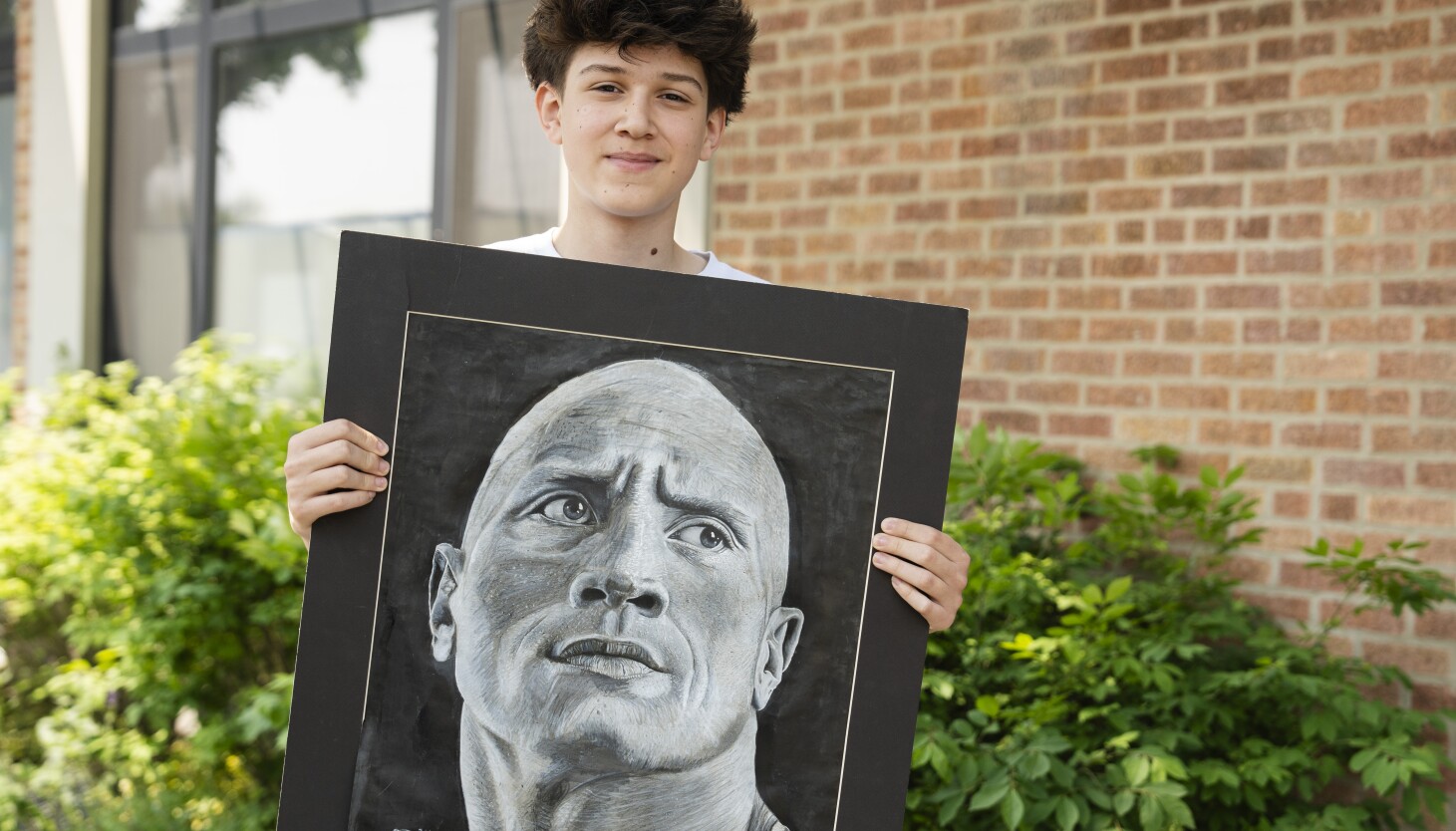 Evanston Teen’s Portrait of the rock a hit with the actor – ryan