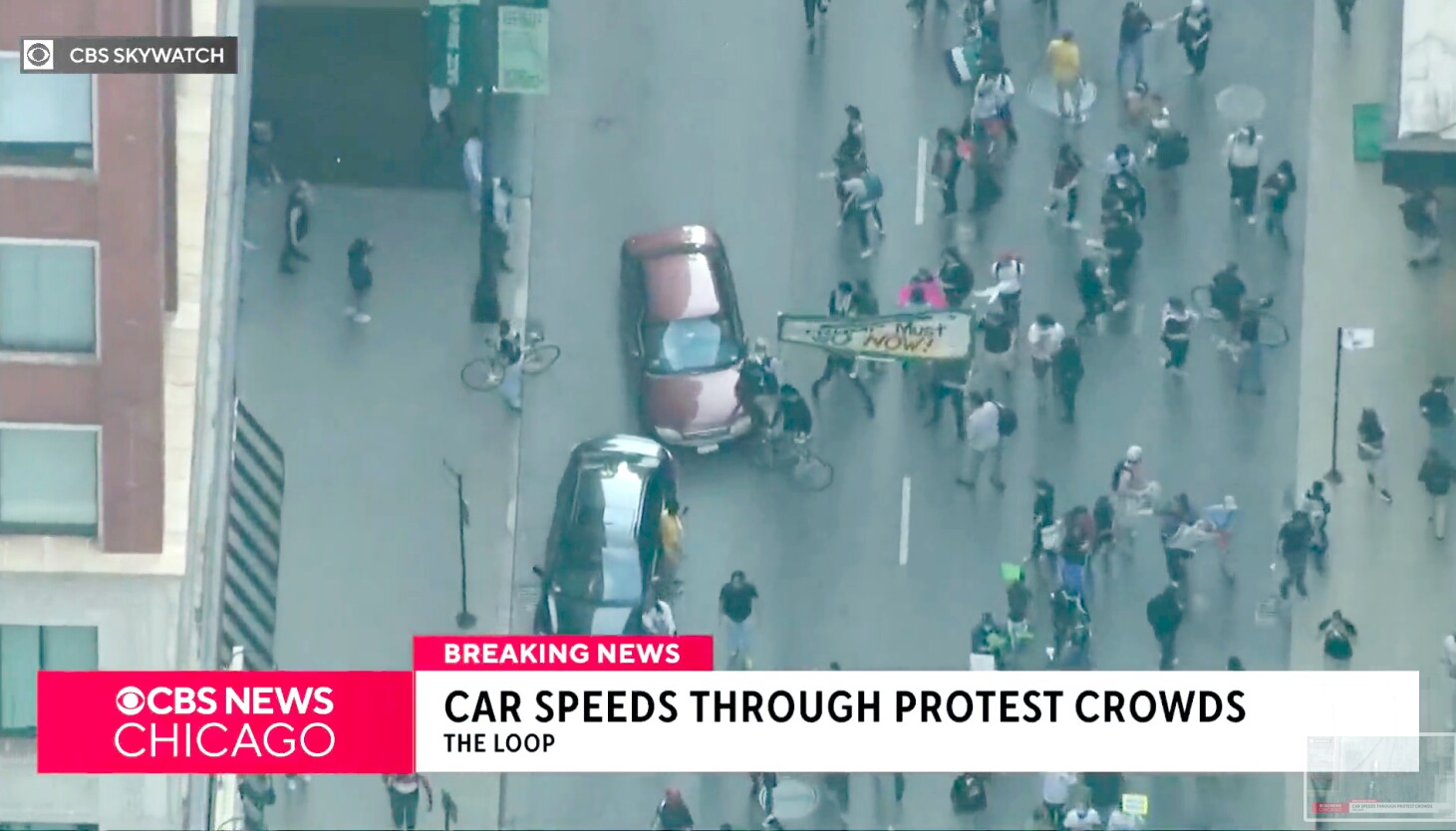vehicle-plows-thru-chicago-direct-as-hundreds-rally-in-cohesion-with-la.-anti-ice-demonstrations