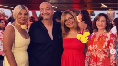 لميس الحديدي وعمرو أديب في الساحل الشمالي بفستان أحمر