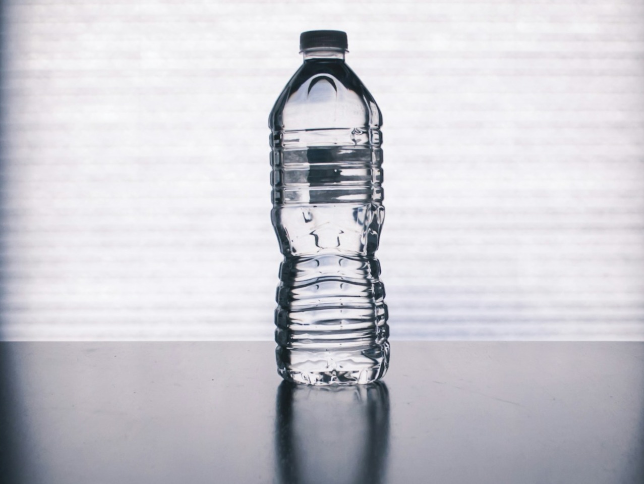 How does plastic bottles make of water poison?