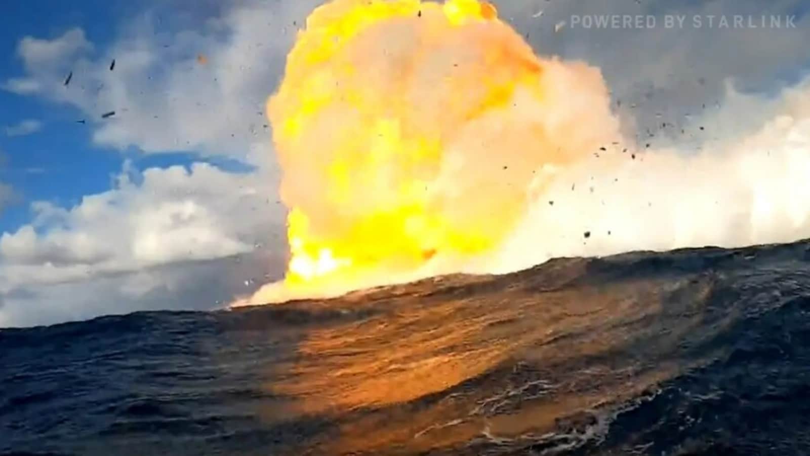 Fiery flames over the Indian Ocean, while Elon Musk’s SpaceX Starship burns on the back flame on Splashdown-Watch