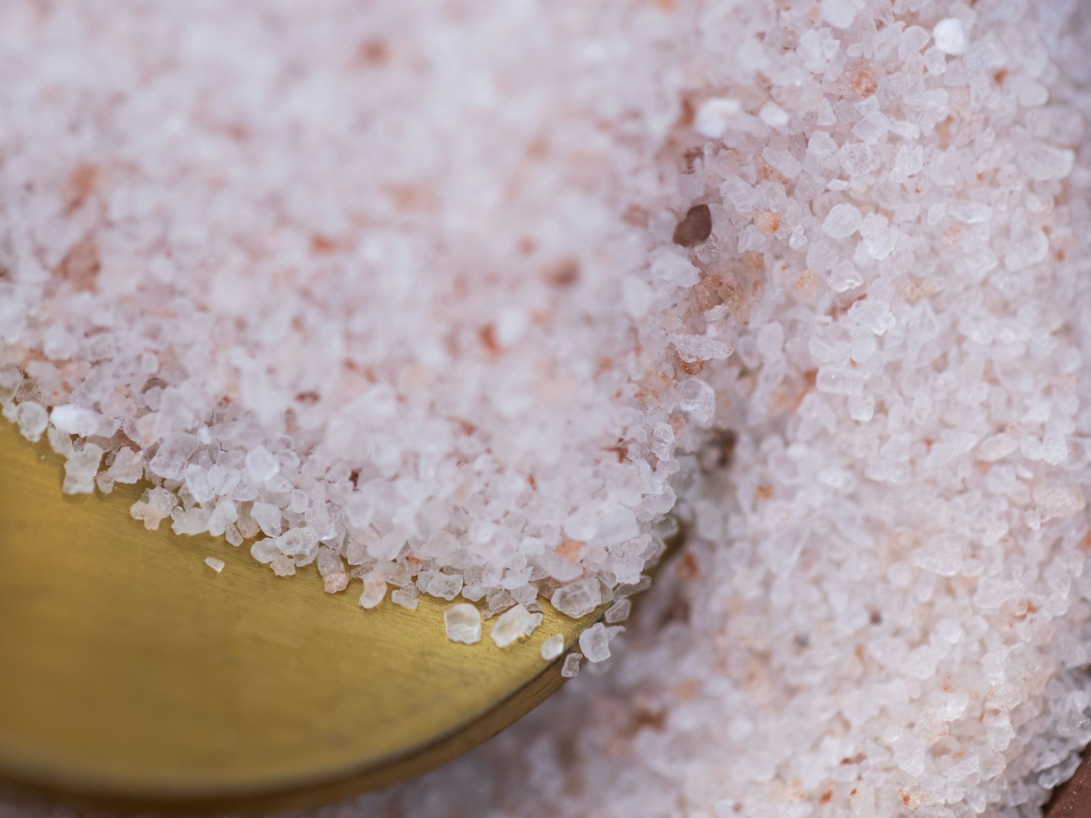 What are the benefits of bathing by adding salt to the water?
