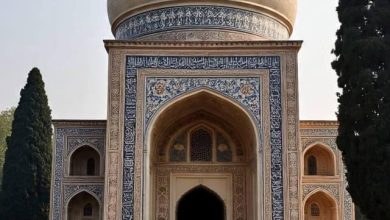 Where was the mughal -vocal Muzzam buried?