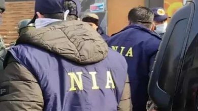 Who is the notorious terrorist Tariq Ahmed Mir? Of which the NIA attached assets, connection to Hizbul Mujahideen