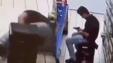 Video of a person sitting with gun in the shop on social media has surprised people