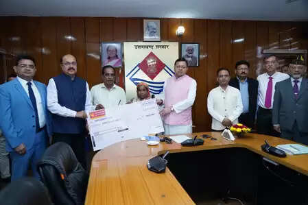 Families from Upanal employees who lost their lives in the accident have compensation of Rs 50 lakh each, CM Dhami handed over checks.
