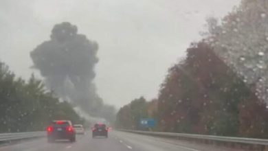 Plumes of smoke seen above Interstate 195, after raying crashed on a highway in Massachusetts; 2 dead
