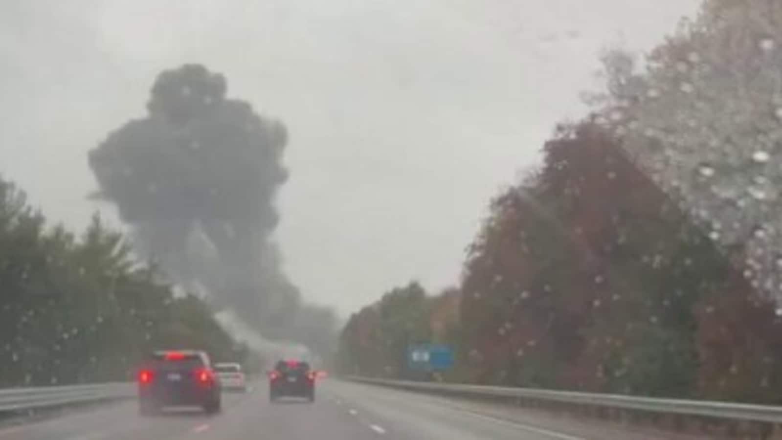Plumes of smoke seen above Interstate 195, after raying crashed on a highway in Massachusetts; 2 dead