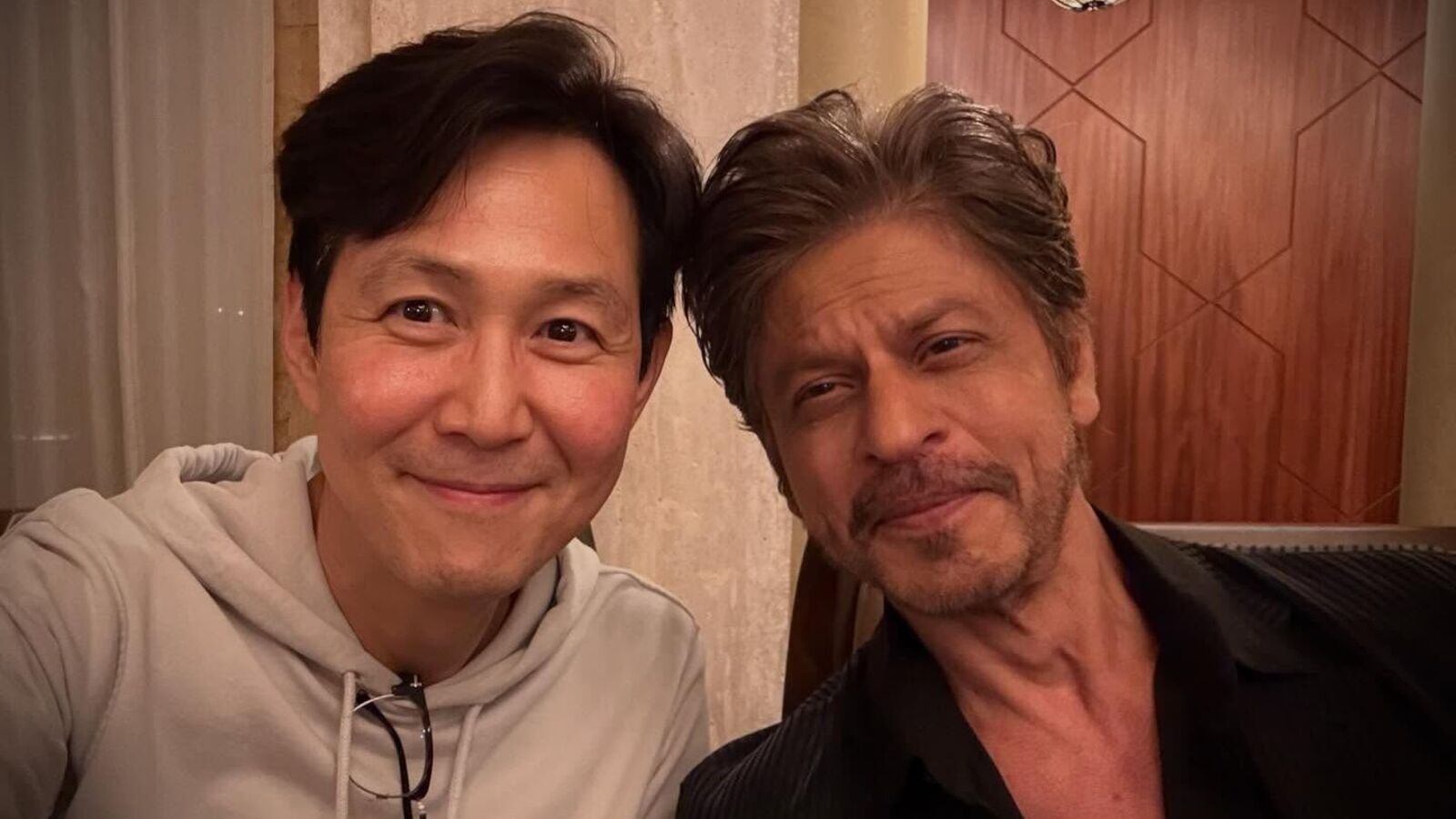 Squid Game meets Bollywood: Lee Jung-jae shares selfie with Shah Rukh Khan at Joy Forum 2025