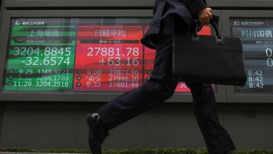 Asian shares fall under pressure from a wave of selling in shares of precious metals companies