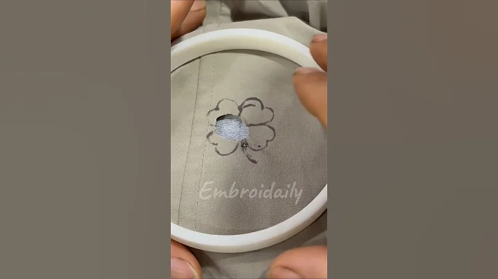 Patching holes in clothes with flower embroidery #embroidery #shorts