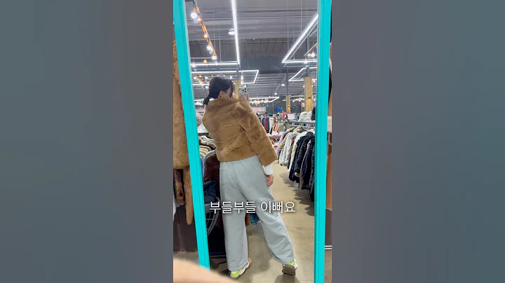 Rumi's mother shopping for baby clothes