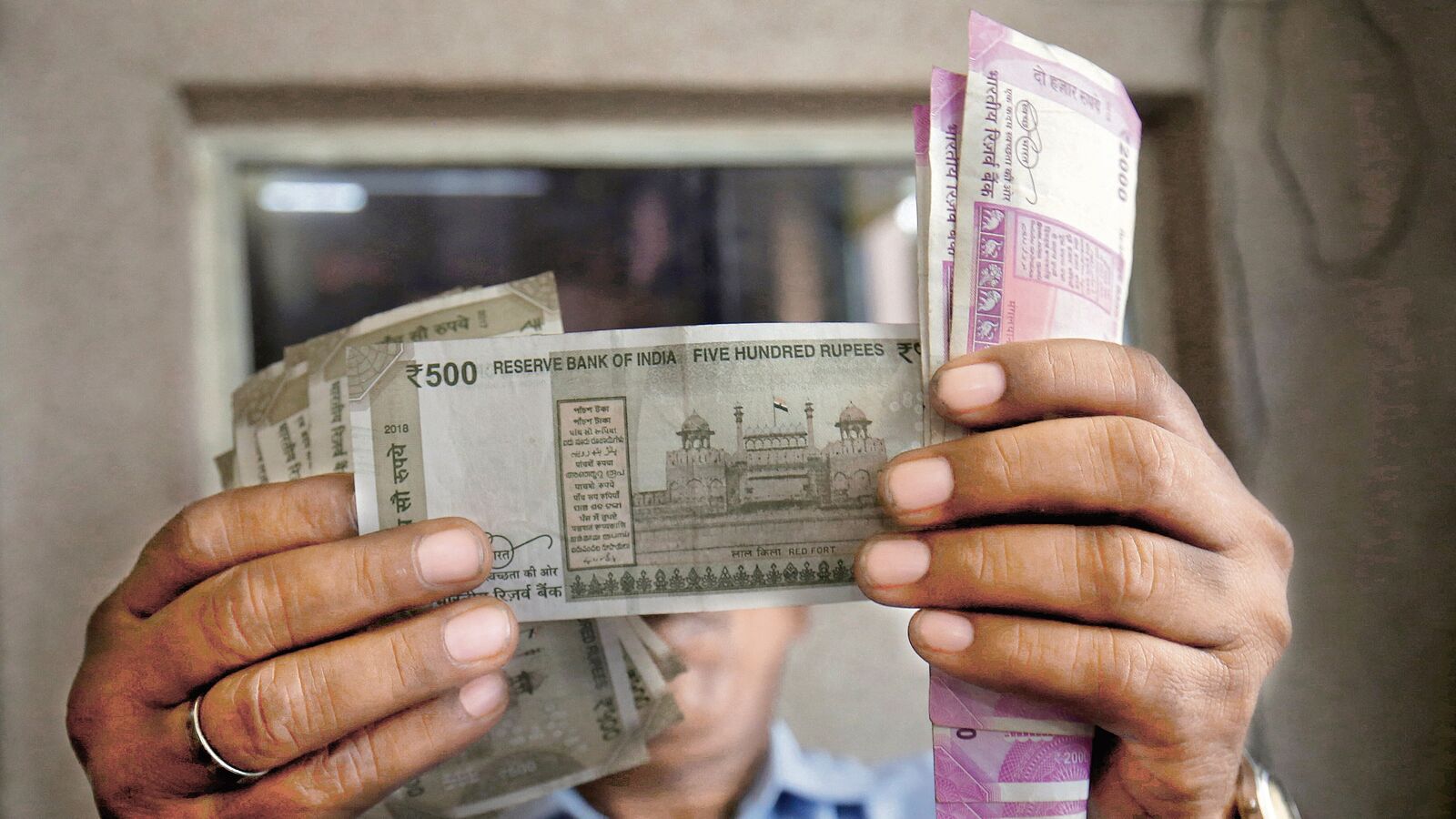Rupee falls to fresh record low of 89.85 against US dollar amid weak flows, trade deals
